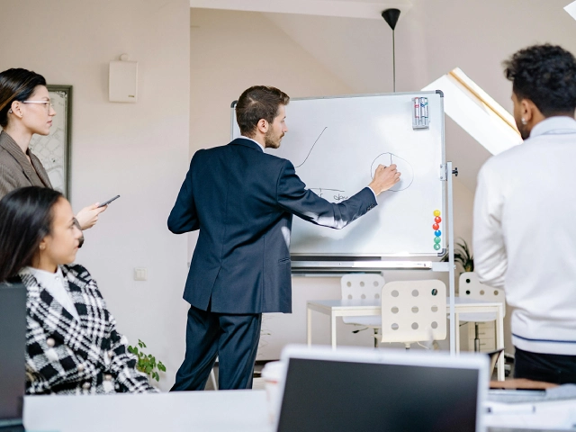 Our team of experienced English instructors collaborating on a lesson plan.