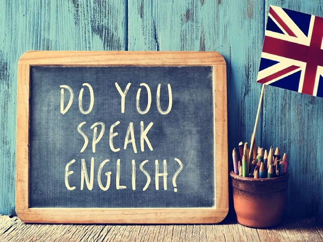 「Do you speak English?!」の看板：浜松町で大人の日本人がリラックスして学べる英会話レッスンのイメージ